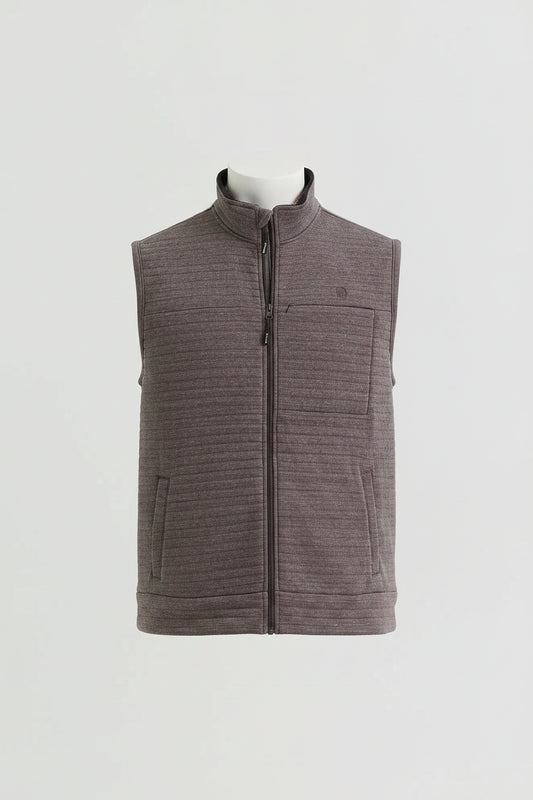 ribbed toast zip-up vest against a light gray studio background.
