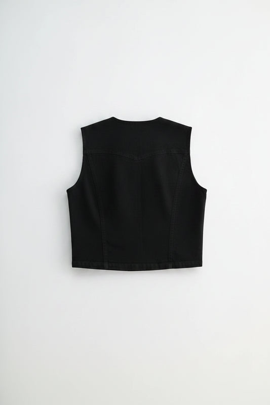 a black sleeveless top on a plain background