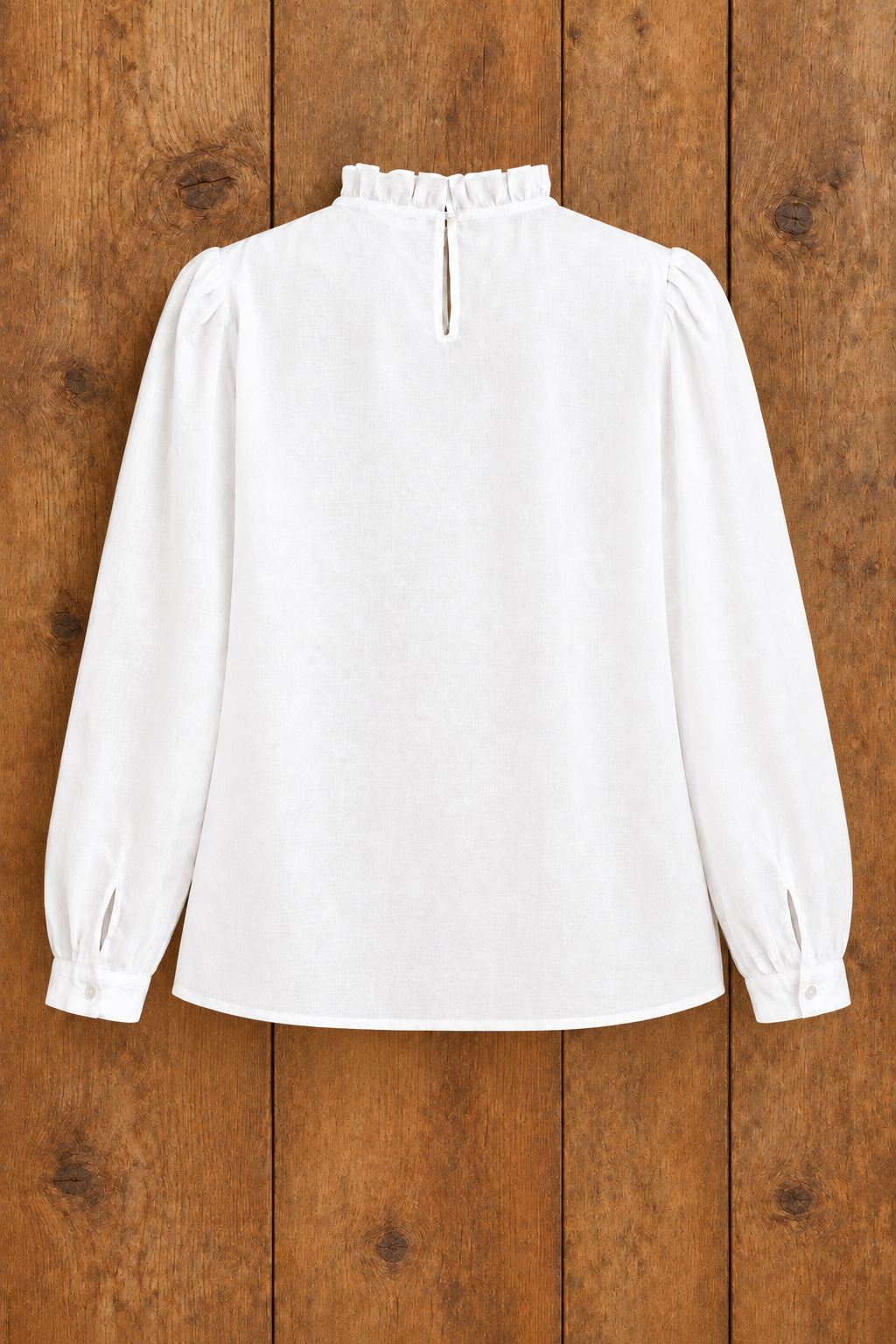 Back view of the White Lace Trimmed Blouse with a ruffled neckline and keyhole detail against a studio background.