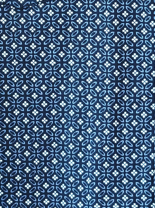 Blue and white geometric patterned fabric texture
