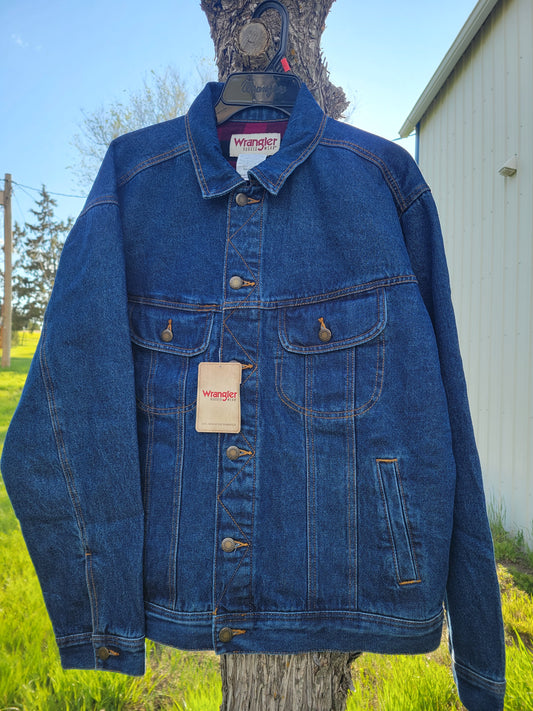 Wrangler Rugged Wear Flannel Lined Denim Jacket with Back When They Bucked Embroidered logo on the back.