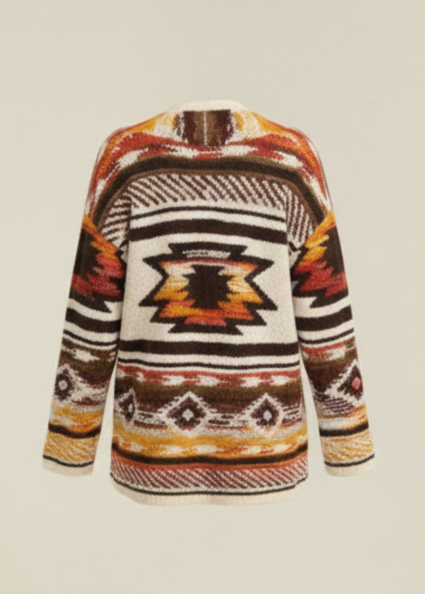 Person wearing a patterned sweater with a neutral background