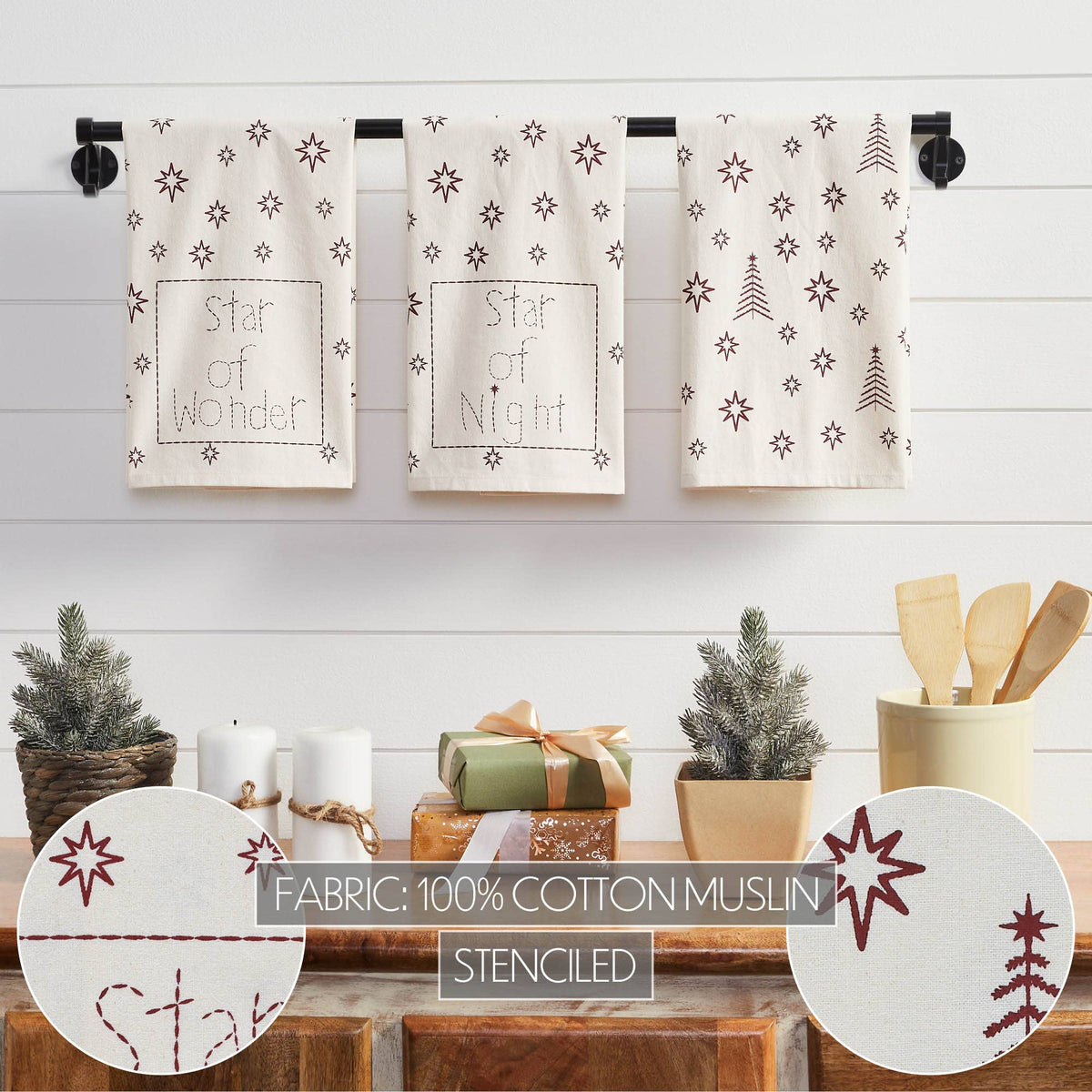 Cream and burgundy Christmas tea towels displayed in a holiday kitchen with close-ups of the stenciled cotton fabric.