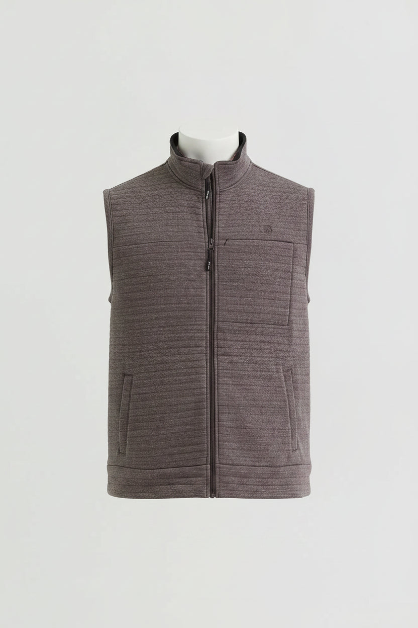  ribbed toast zip-up vest  against a light gray studio background.