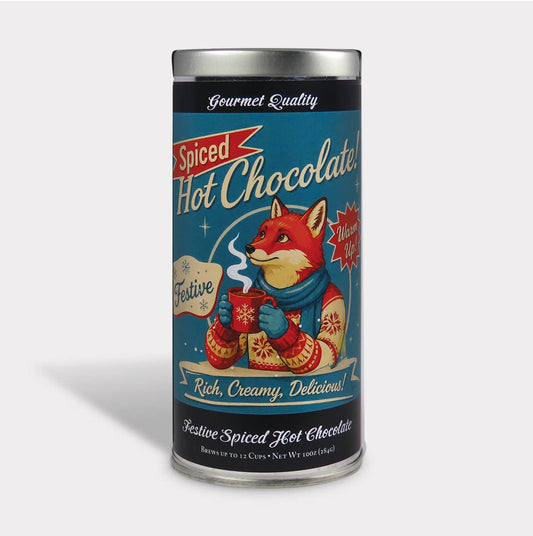 Wonderland Spiced Hot Chocolate tin featuring a fox in a winter sweater holding a red mug