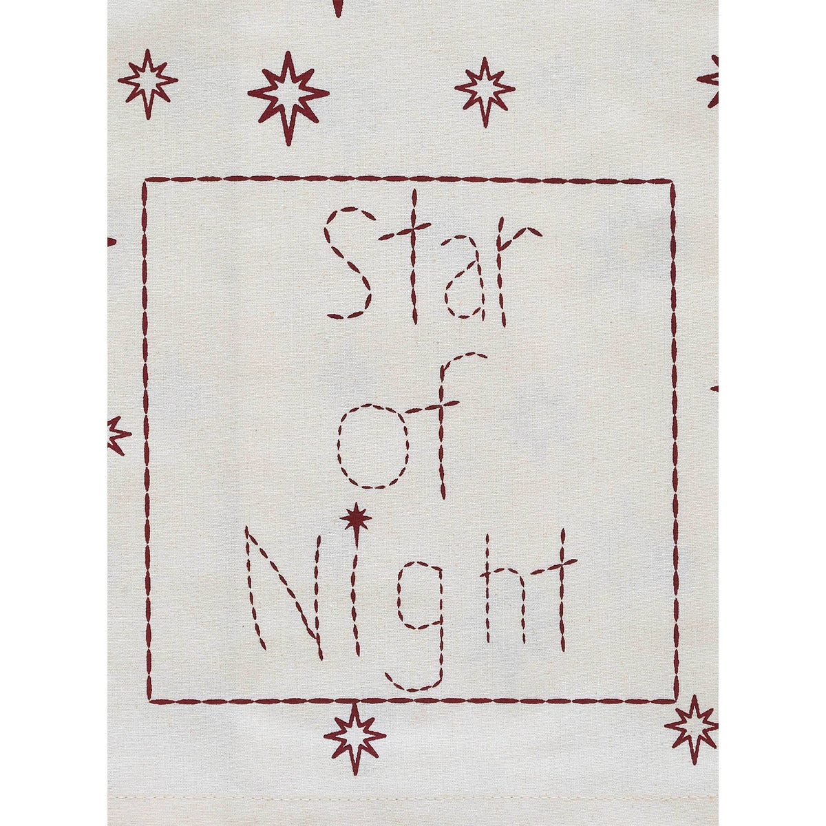 Star of Night Christmas tea towel with burgundy stars and decorative lettering on cream cotton.