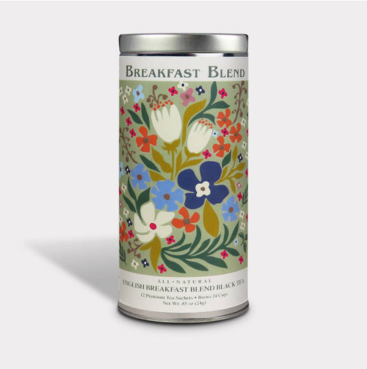 Breakfast Blend black tea tall tin with colorful flowers and green leaves on a pale green background
