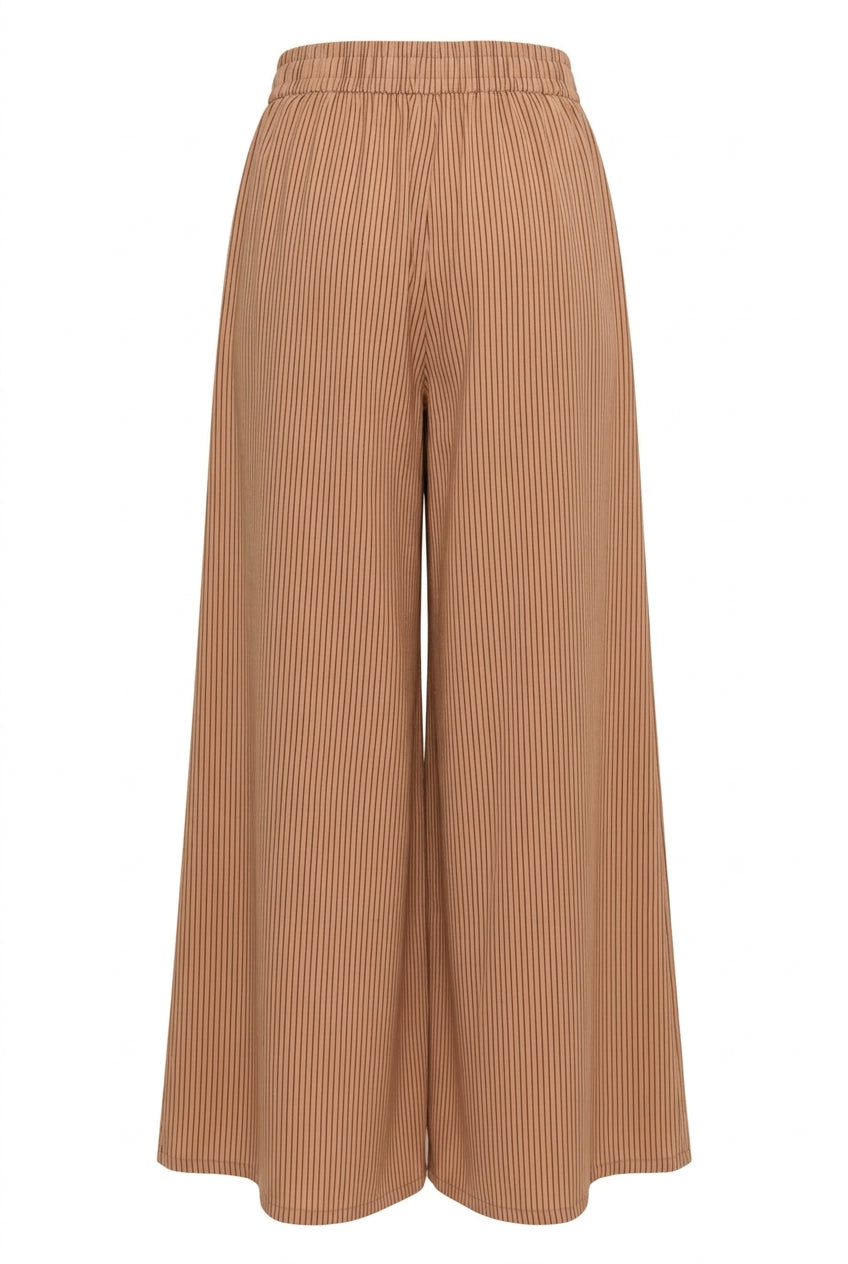Back view of wide-leg palazzo pants with burgundy pinstripes on a tan background and an elastic waistband.