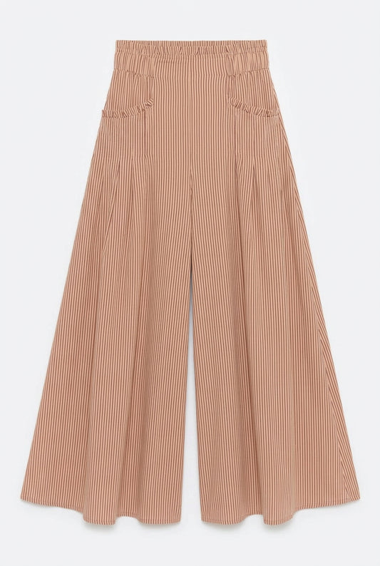 Front view of wide-leg palazzo pants with burgundy pinstripes on a tan background and two patch pockets.