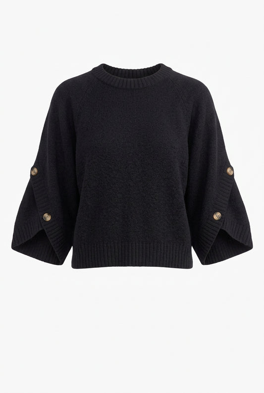 Black knit pullover with a round neckline, wide sleeves with button accents, and a ribbed hem, shown from the front.