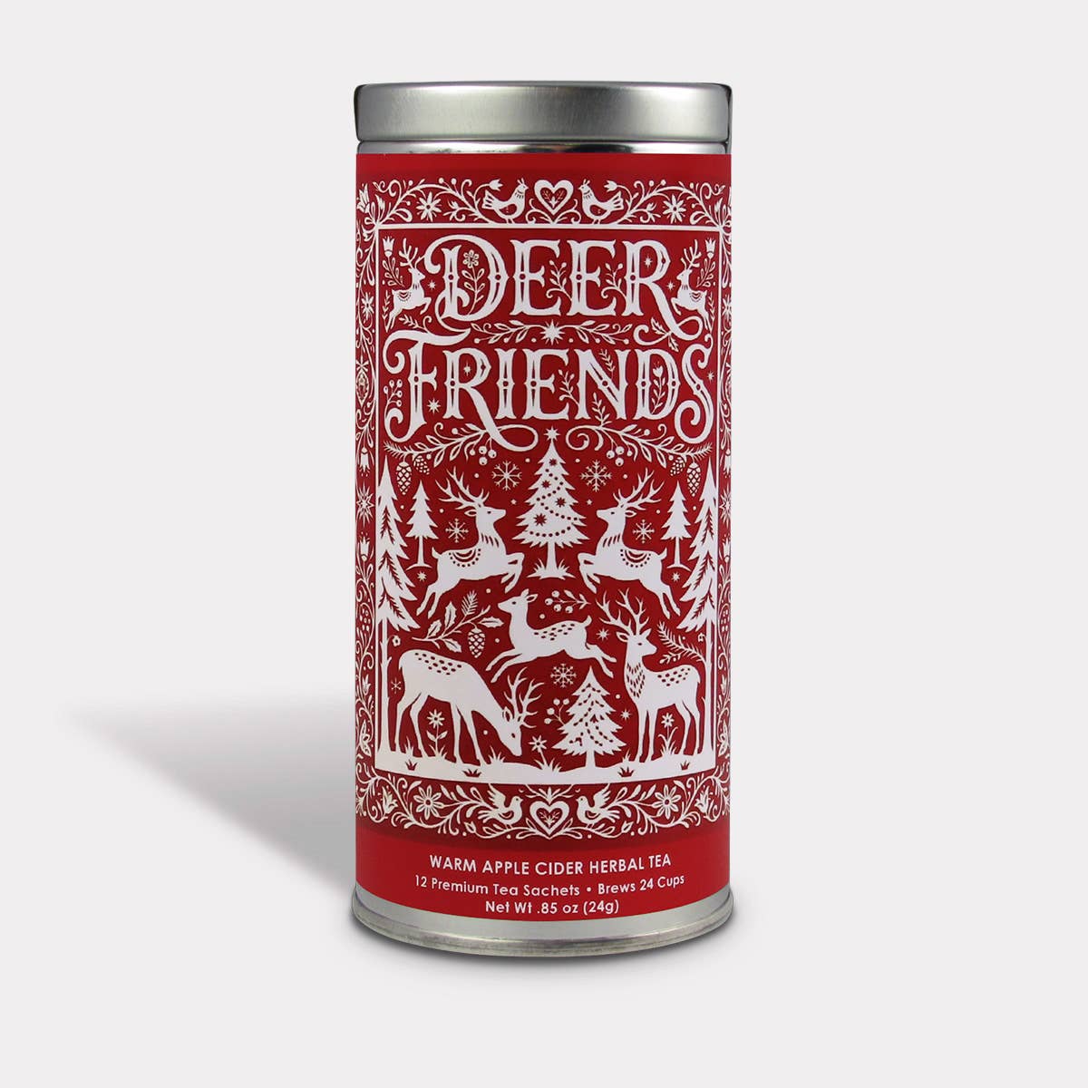 Deer Friends Apple Cider Herbal Tea in a red holiday tin with white deer, evergreen trees, and snowflakes