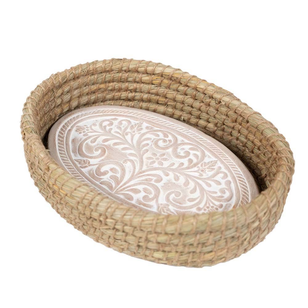 Toasty Bread Basket with a whitewashed floral-patterned terracotta warming insert inside an oval woven basket
