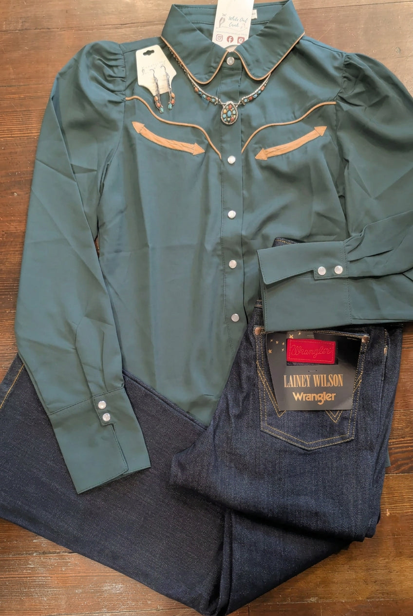 Howdy Hanny forest green Western pearl snap shirt styled with dark-wash jeans and a coordinating pendant necklace.