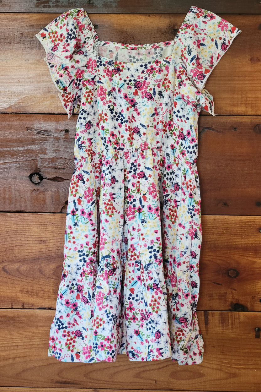Floral dress on a wooden surface