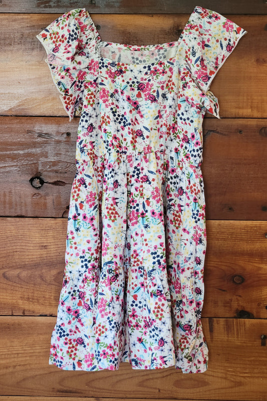 Floral dress on a wooden surface