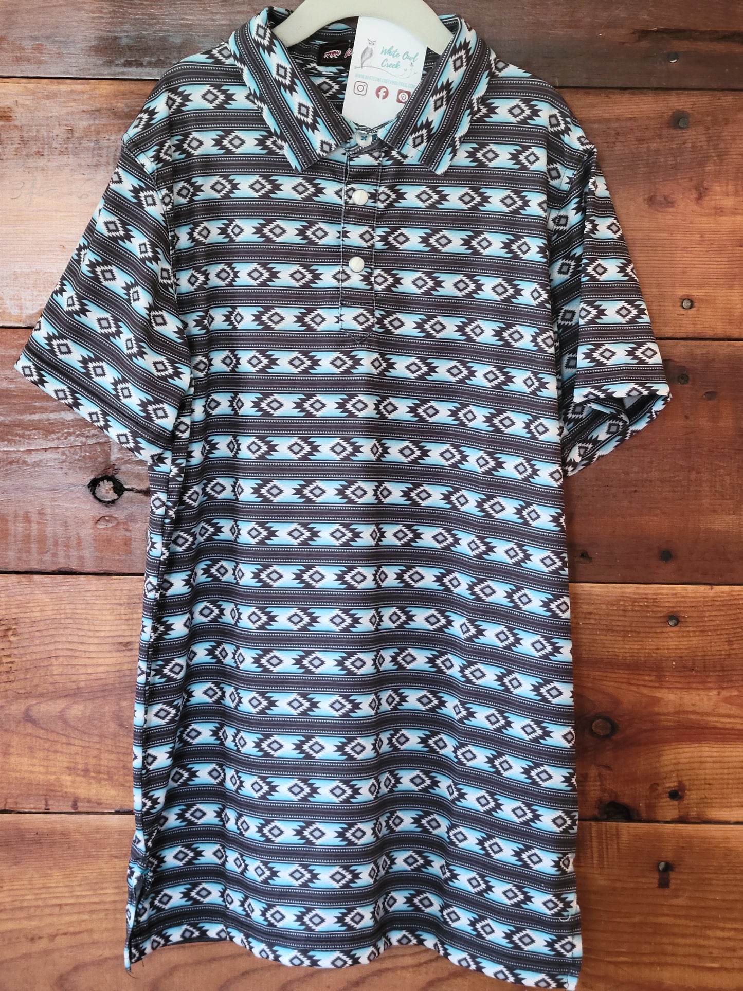 Patterned shirt on a wooden surface