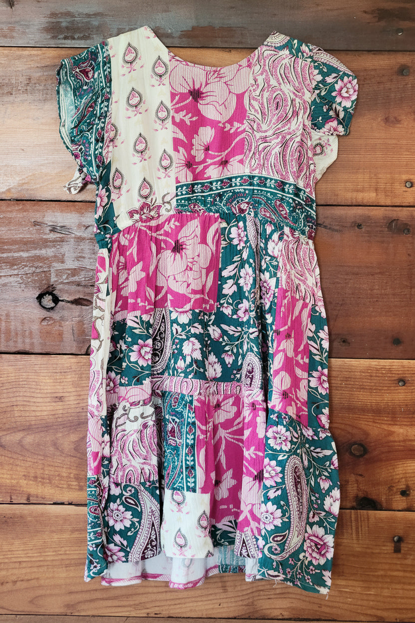  patterned Dress on a wooden surface