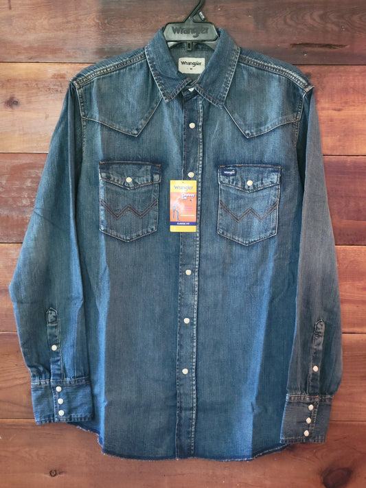 Blue denim shirt on a wooden surface