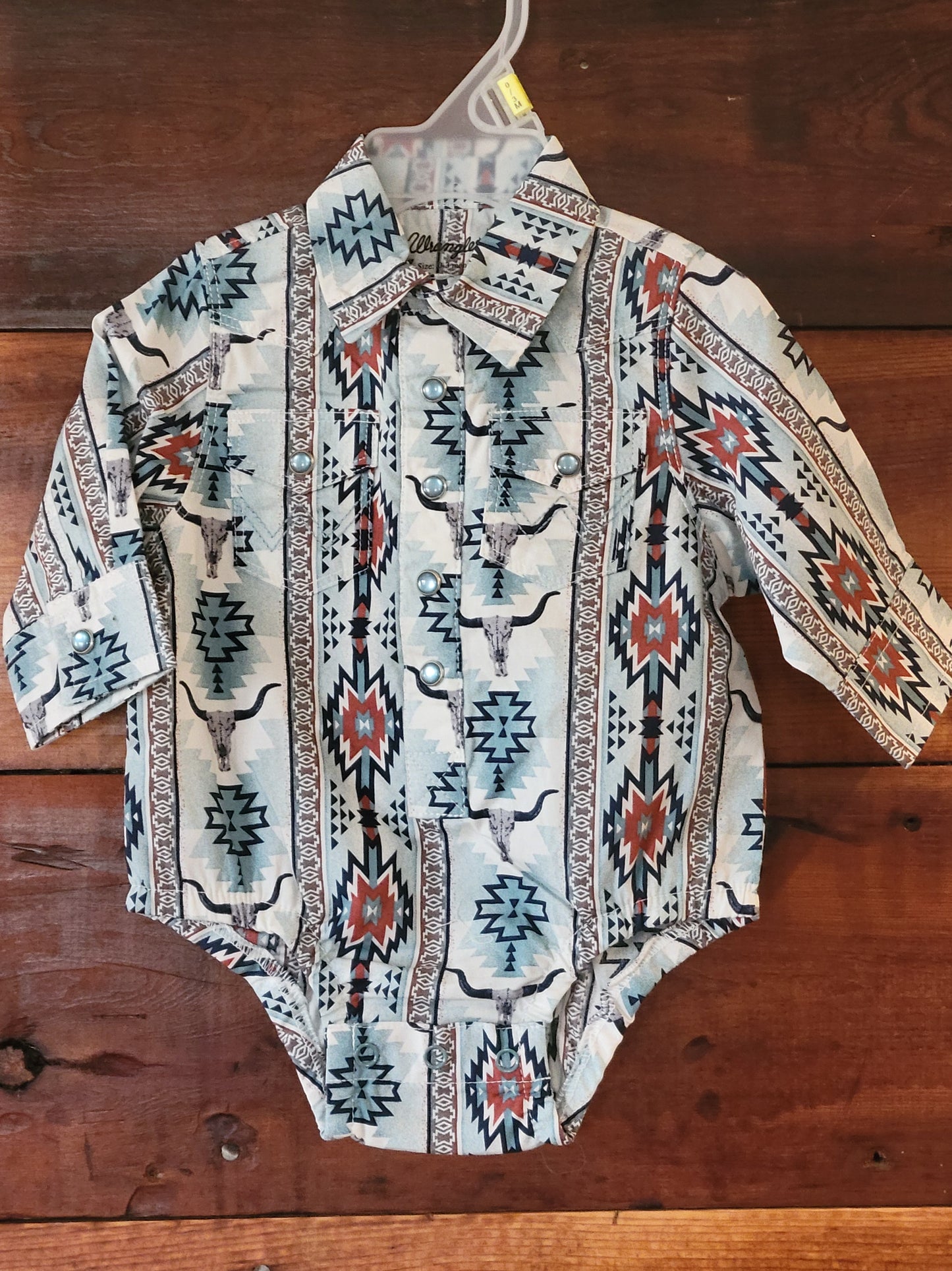 Patterned shirt on a wooden surface