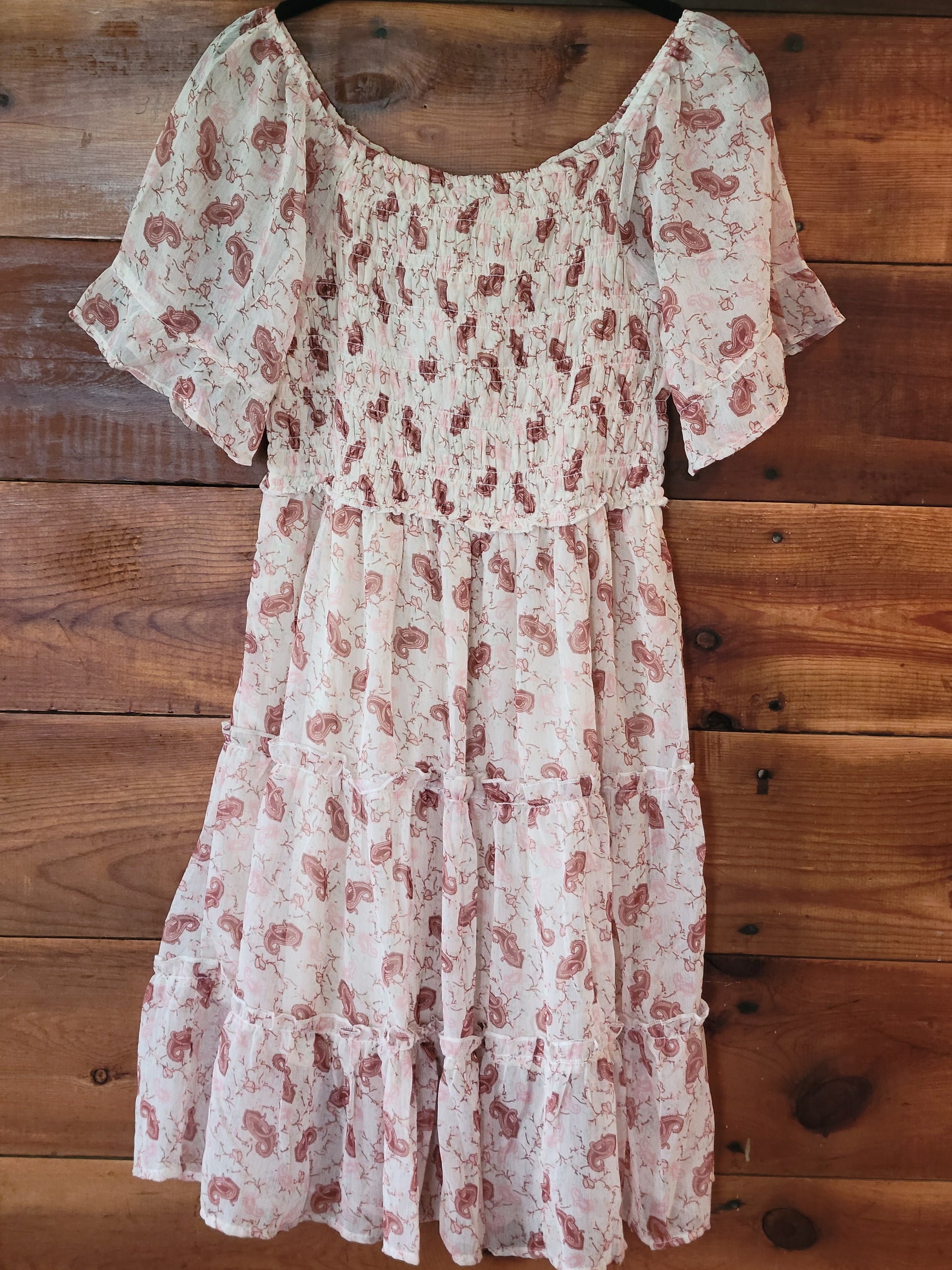 Floral dress on a wooden surface