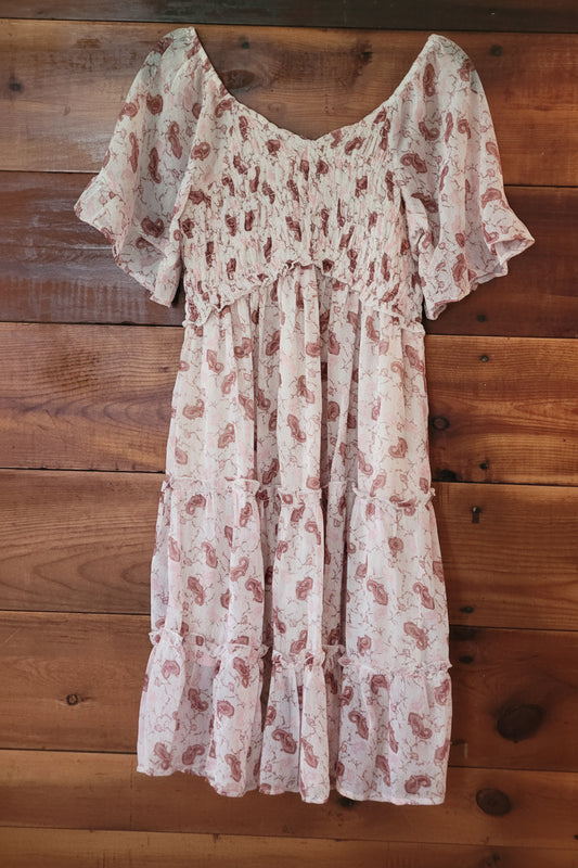 Floral dress on a wooden surface